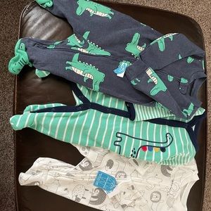 New set of 3 infant footed sleepers. Newborn, 0-3m